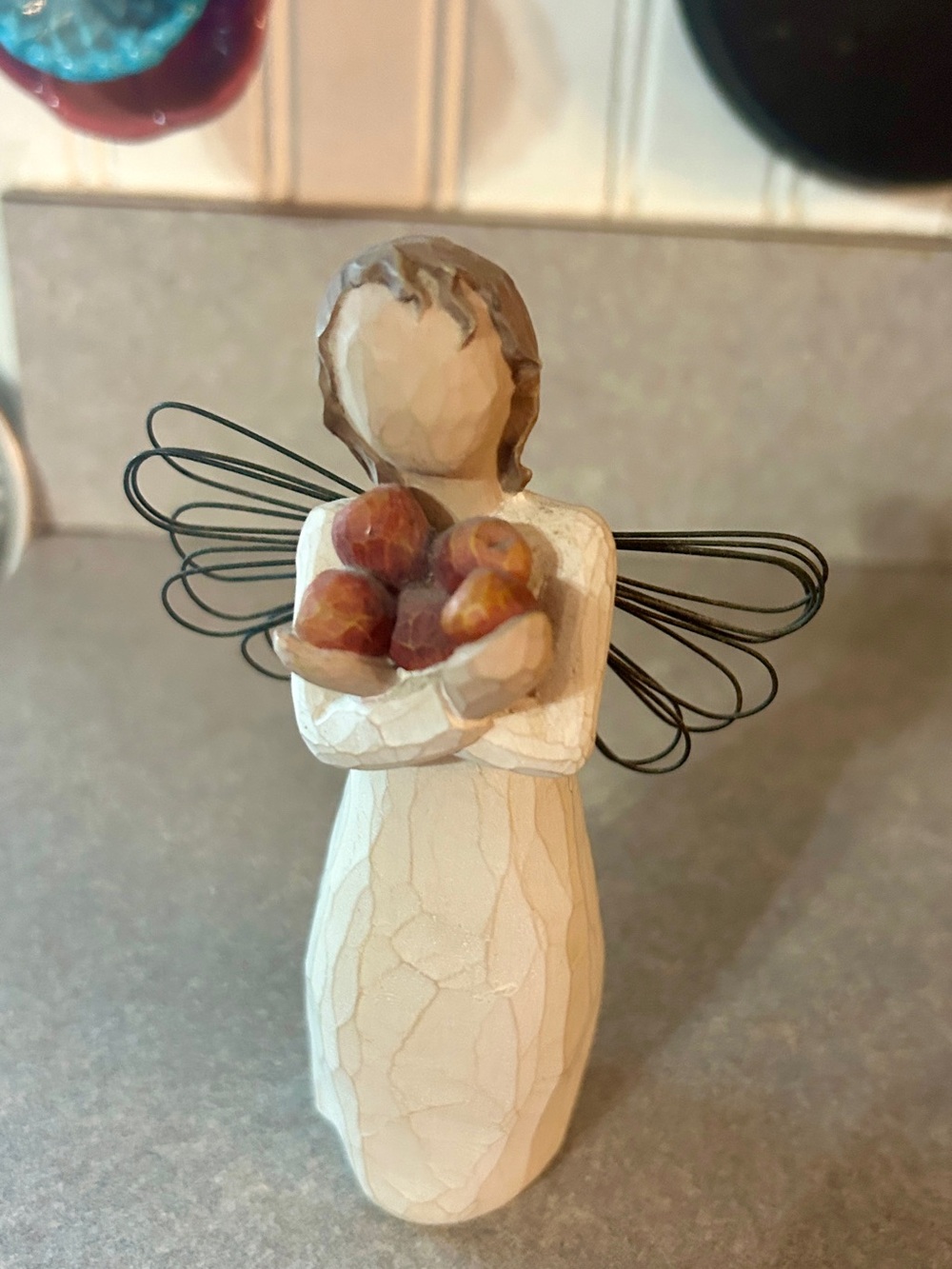 Willow Tree Cream Angel Figurine with Red Apples and Black Wire Wings